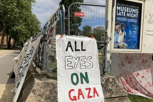 A student protest sign reads 'all eyes on Gaza' at a camp in Oxford
