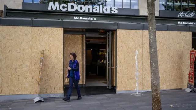Boarded up restaurant in Paris, 6 July