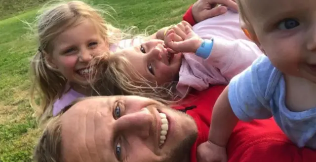 Rob Burrow with his children