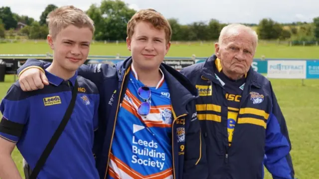 John Germaine WITH grandson Charlie Germaine and James Smith at Featherstone Rovers for the funeral of Rob Burrow