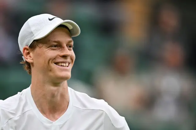 Jannik Sinner smiles