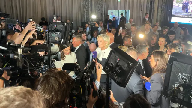 Marine Le Pen speaking to the media