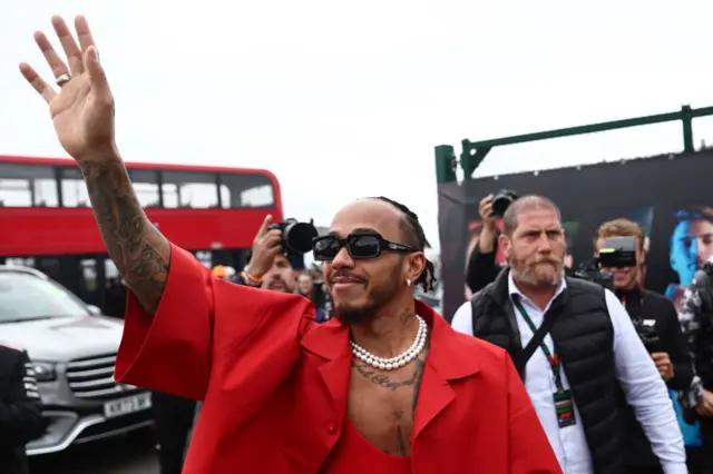 Lewis Hamilton waves to the crowds