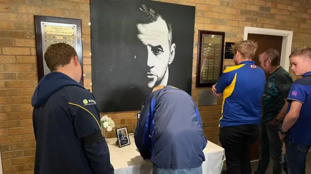 People sign book of condolence