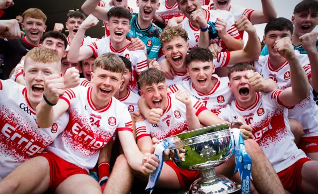 Derry celebrate winning the Tom Markham Cup after victory over Armagh
