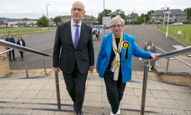 cottish First Minister and SNP leader John Swinney campaigning with Edinburgh South West Parlimentary candidate Joanna Cherry (right), at Asda Chesser Supermarket, in Edinburgh, while on the General Election campaign trail in June