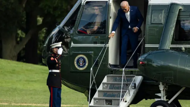 US President Joe Biden disembarks from Marine One