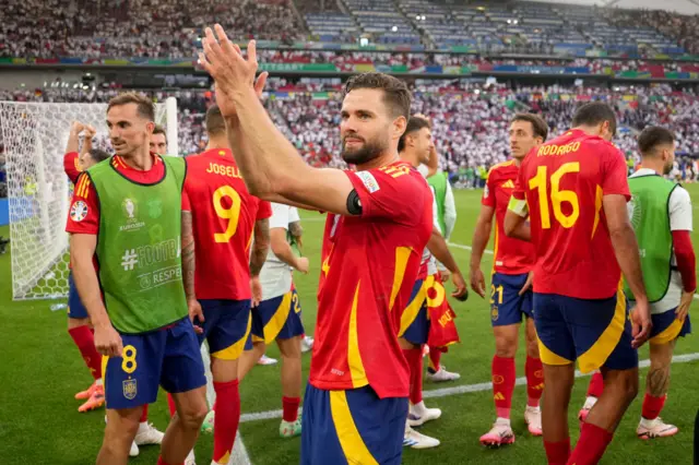 Spain celebrate after beating Germany at Euro 2024