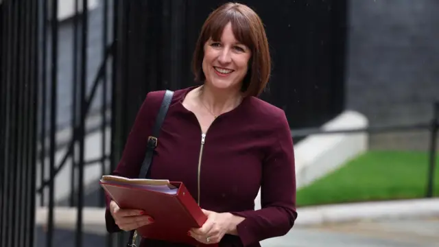 Chancellor Rachel Reeves walking into Number 10 Downing Street