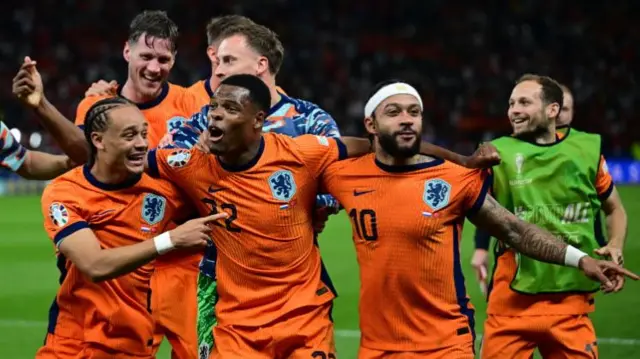 Netherlands players celebrate after beating Turkey in the quarter-finals