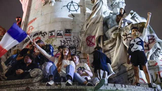 People react after the second round of the French legislative elections results at Place de la Republique in Paris, France, 07 July 2024.