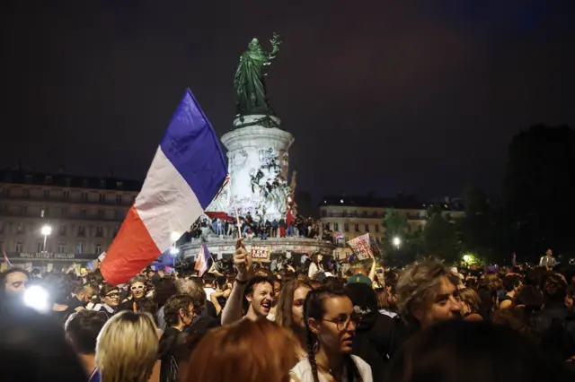 More flag waving in the plaza