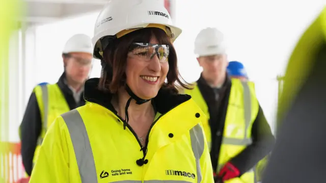 Britain's Labour Party Shadow Chancellor of the Exchequer Rachel Reeves visits a building site in London