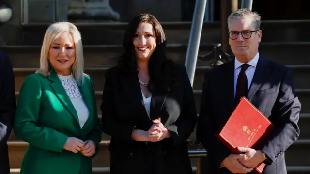 British Prime Minister Keir Starmer poses with First Minister of Northern Ireland Michelle O'Neill and Deputy First Minister of Northern Ireland