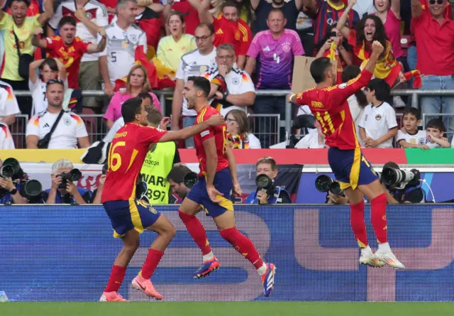 Spain celebrate after scoring a winning goal against Germany at Euro 2024