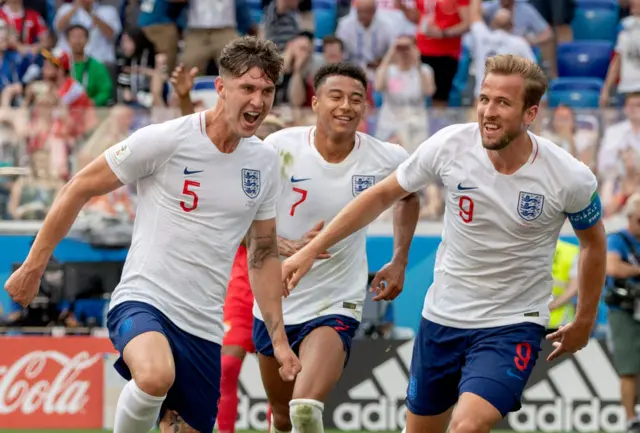 John Stones, Jesse Lingard and Harry Kane celebrate