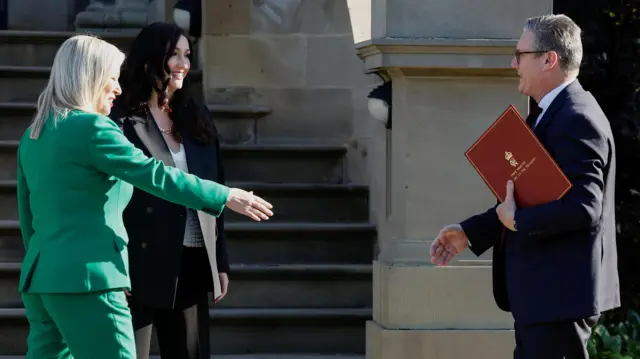 British Prime Minister Keir SStarmer and First Minister of Northern Ireland Michelle O'Neill meet at Stormont Castle, in Belfast,