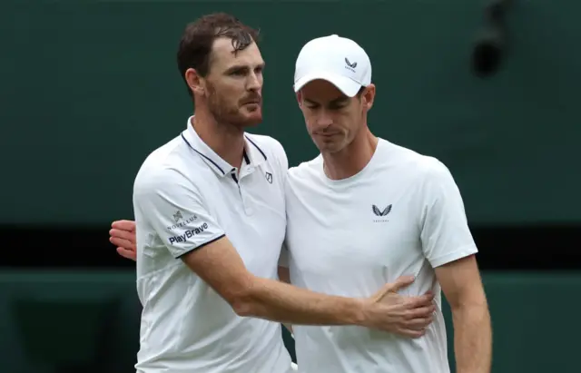 Jamie Murray hugs brother Andy Murray