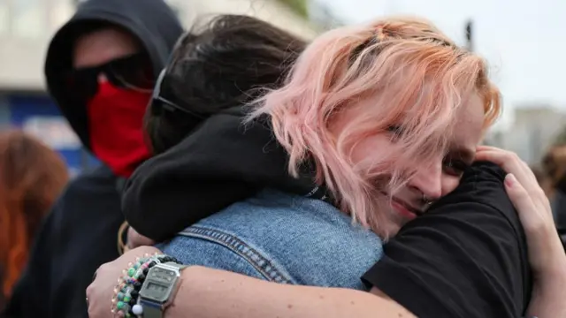 People react after partial results in the second round of the early French parliamentary elections Nantes, France, July 7, 2024