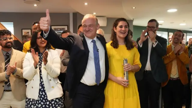 Liberal Democrat leader Sir Ed Davey is greeted by supporters as he returns to Lib Dems HQ in central London following the result of the 2024 General Election