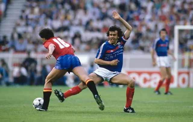 France captain Michel Platini challenges Lopez Alfaro of Spain