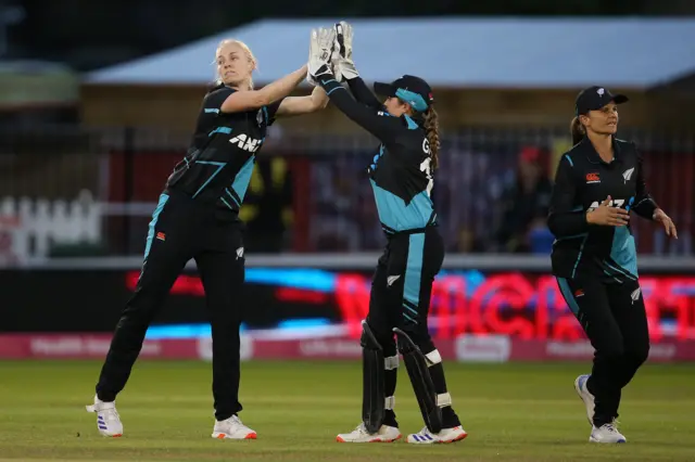 Hannah Rowe celebrates the wicket of Danni Wyatt