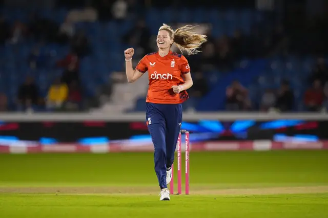 Lauren Bell celebrates the wicket of Sophie Devine
