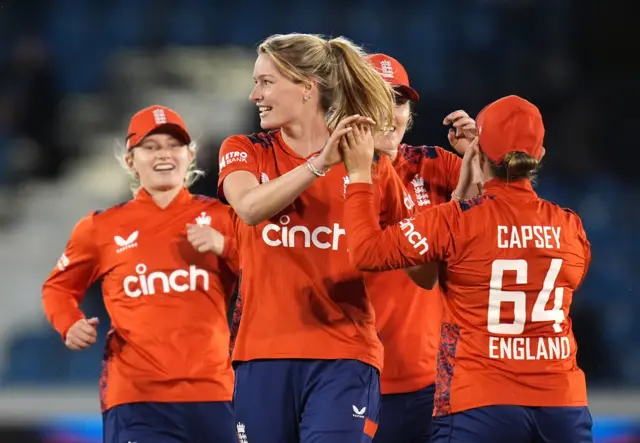 Lauren Bell celebrates the wicket of Sophie Devine