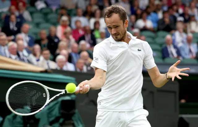 Daniil Medvedev hits a forehand shot