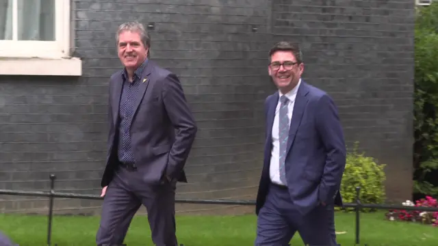 Liverpool City Region Mayor Steve Rotheram and Greater Manchester Mayor Andy Burnham arrive at Downing Street