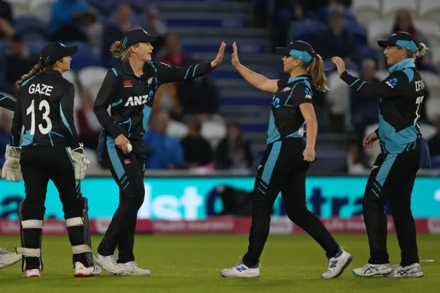 New Zealand celebrate the wicket of Maia Bouchier