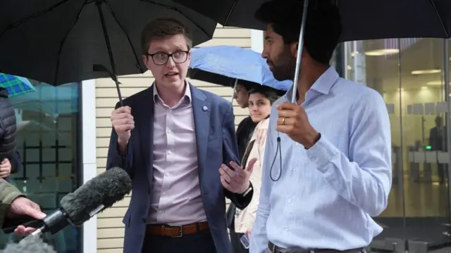 Dr Robert Laurenson (left), co-chair of the British Medical Association's junior doctors' committee and Vivek Trivedi (right), the co-chair of the junior doctors' committee, speak to the media after leaving the Department for Health in central London, following a meeting with Health Secretary Wes Streeting to discuss their pay dispute