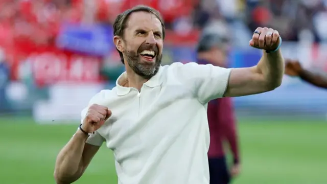 Gareth Southgate celebrates with England fans