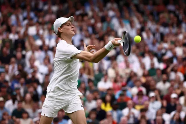 Jannik Sinner hits a forehand shot