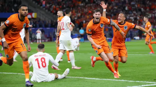 Netherlands players celebrate after scoring against Turkey in the quarter-finals