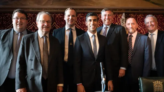 Rishi Sunak poses members of the 1922 Committee in the Houses of Parliament