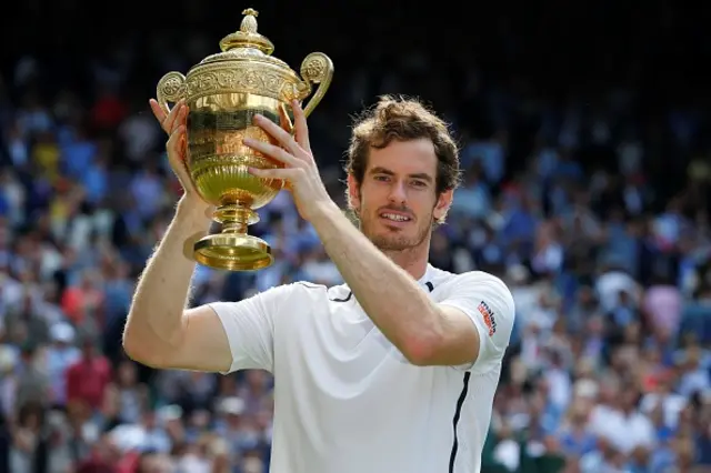 Andy Murray poses with Wimbledon trophy