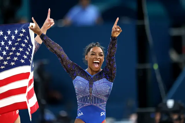 Gold medalist Simone Biles of Team United States celebrates