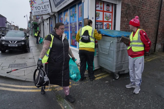 Volunteers clearing debris in Hartlepool