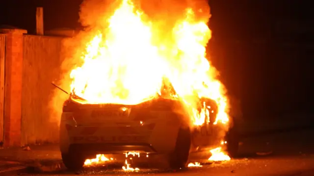 A police car burns in Hartlepool