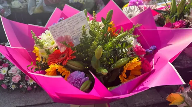 Flowers laid by police community support officers