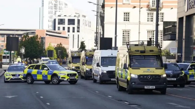 A prison van escorted by multiple police vehicles arrives at Liverpool Magistrates' Court where a 17-year-old boy, who cannot be named for legal reasons, is appearing charged with three counts of murder, 10 counts of attempted murder and possession of a bladed article, following a knife attack at a Taylor Swift-themed holiday club in Southport on Monday. Picture date: Thursday August 1, 2024.