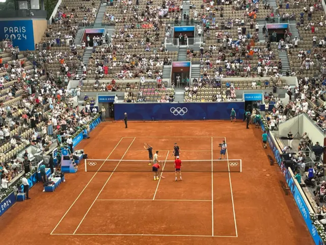 Andy Murray and Dan Evans take to the court