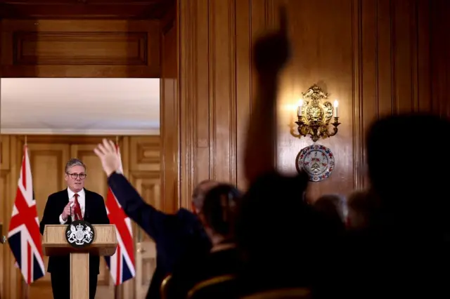 Britain's Prime Minister Keir Starmer answers questions during a press conference, following clashes after the Southport stabbing