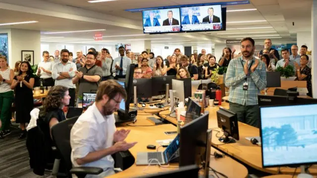 The Wall Street Journal newsroom broke out in cheers when the news broke of their colleague's release