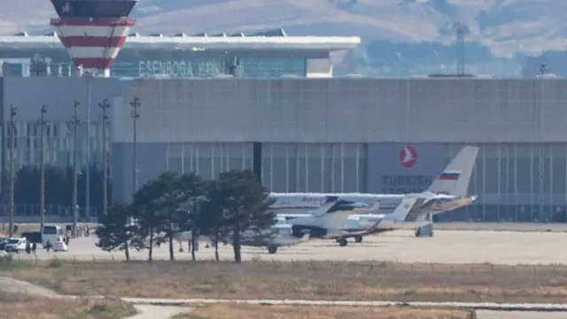 A Russian government plane is seen on the tarmac after landing at Esenboga Airport in Ankara,