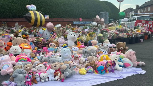 Teddy bears carefully placed on blanket for Akice, Elsie and Bebe who were fatally stabbed on Monday during a dance class in Southport.