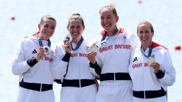 Silver medalists Helen Glover, Esme Booth, Sam Redgrave and Rebecca Shorten of Team Great Britain