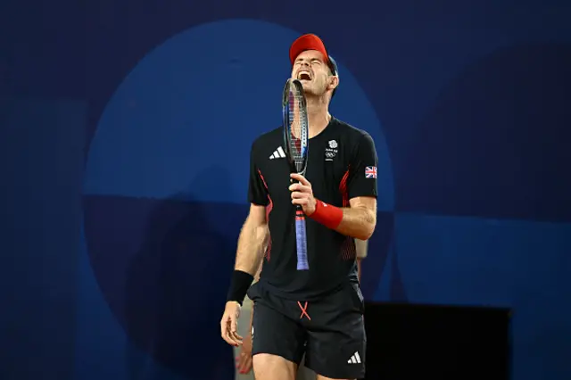 Andy Murray looks on