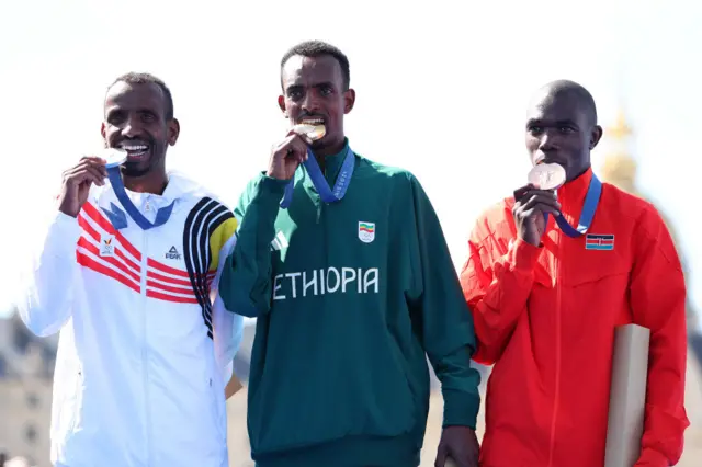 The men's marathon medal winners Tamirat Tola, Bashir Abdi and Benson Kipruto at the 2024 Paris Olympics